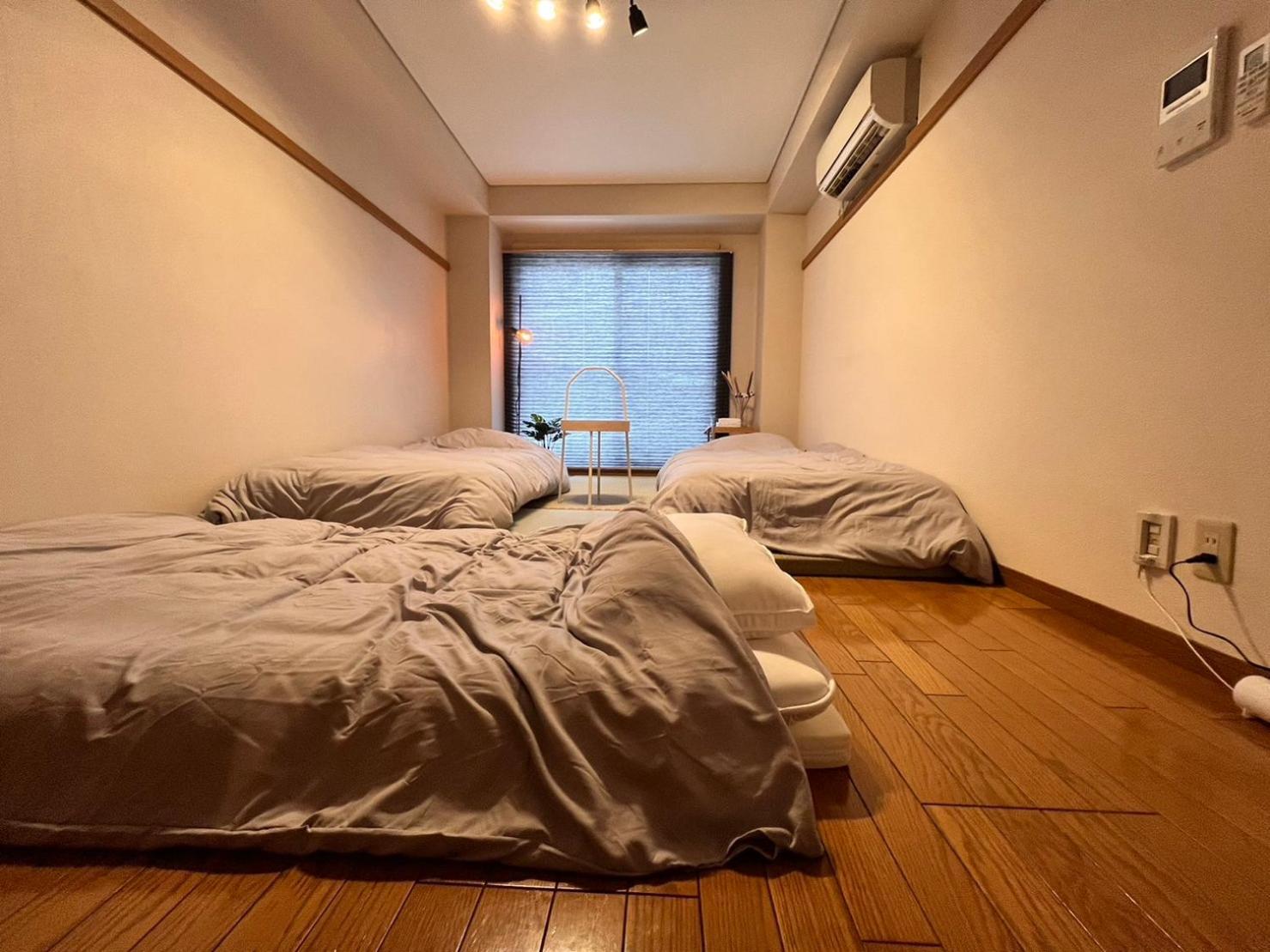 東横のヨコ Apartment Okayama Phòng bức ảnh