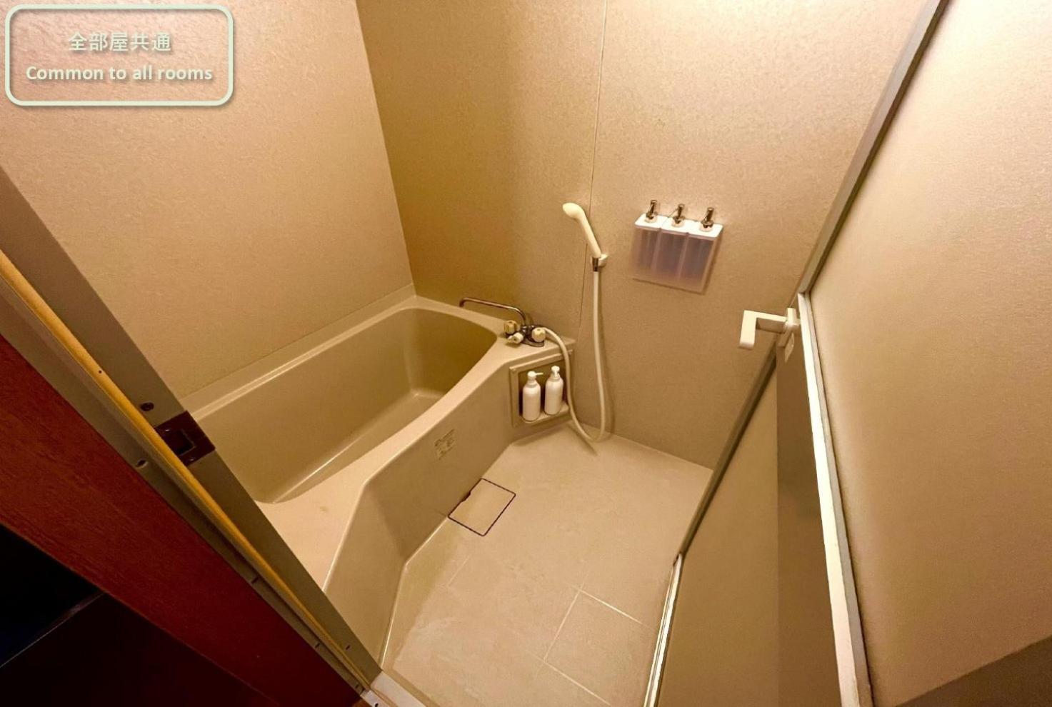 東横のヨコ Apartment Okayama Phòng bức ảnh