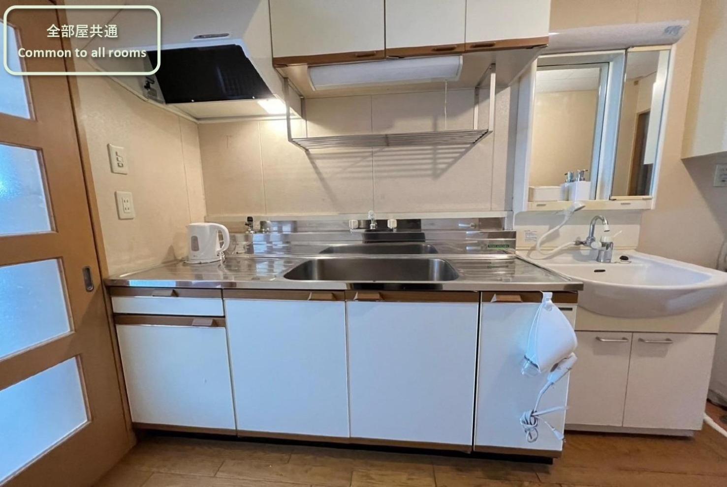 東横のヨコ Apartment Okayama Phòng bức ảnh